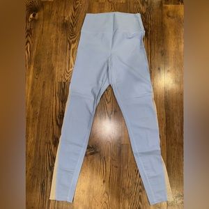 Carbon 28 light blue leggings with sheer stripes on sides of legs